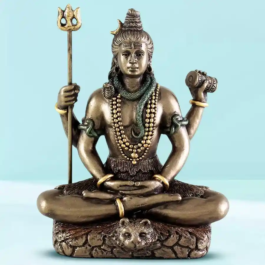 Holy Sitting Shiva Bronze Idol in vibrant colors, symbolizing peace and spirituality.