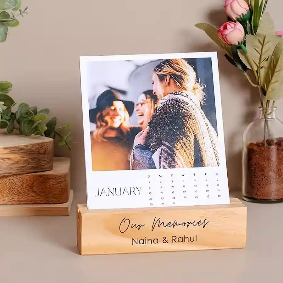 Personalized 2024 calendar showcasing cherished memories with a pine wood base, perfect for home or office decor.