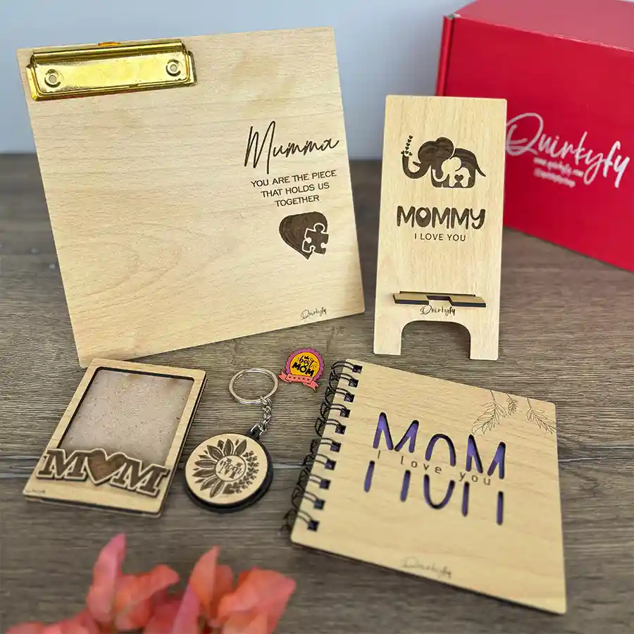 Heartwarming Mother's Day Gift Set featuring a Polaroid frame, mobile stand, keychain, diary, and picture clip plank for celebrating moms.