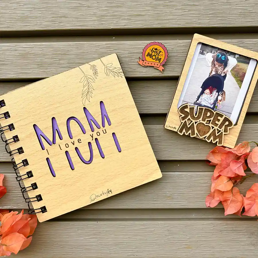Heartfelt Mother's Day Gift Ensemble featuring a Pinewood Notebook, Personalized Photo Frame Magnet, and a stylish Lapel Pin.