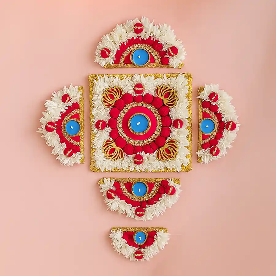 Diya and Gajra Rangoli Delight set featuring a half-circle design and beautifully crafted diyas for festive celebrations.