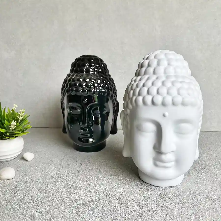 A serene white Buddha head lamp, designed to create a calming atmosphere in any room.