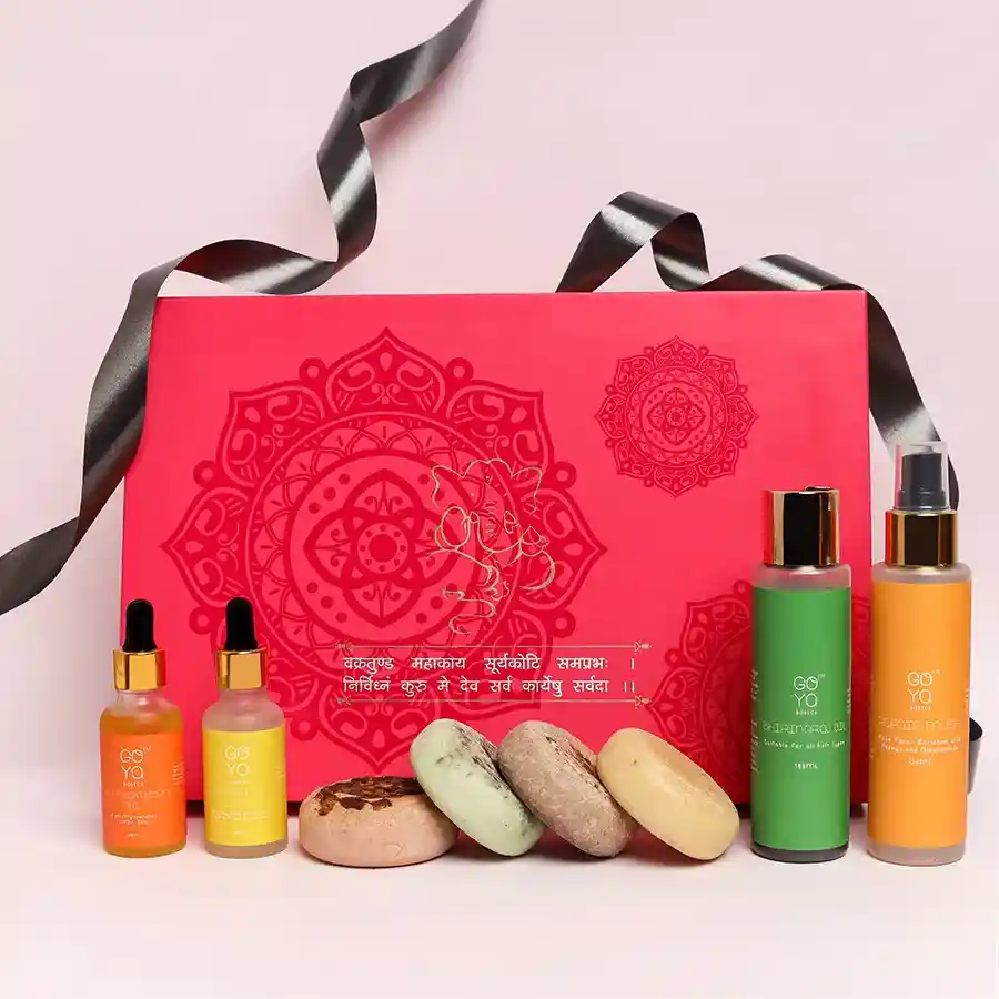 Luxurious beauty gift set featuring goat milk soaps, hair oils, and face masks for a natural skincare experience.