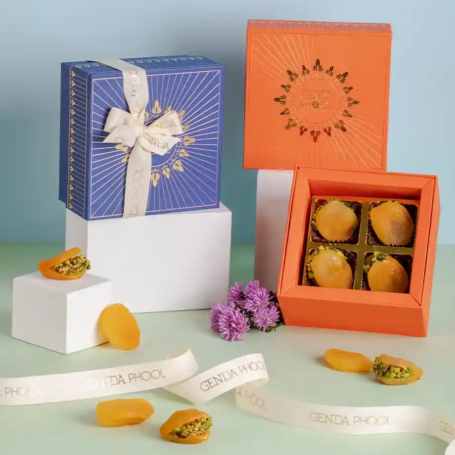 Gourmet Apricots filled with Pistachio and Cranberry topped with Gold Varq in an elegant gift box.