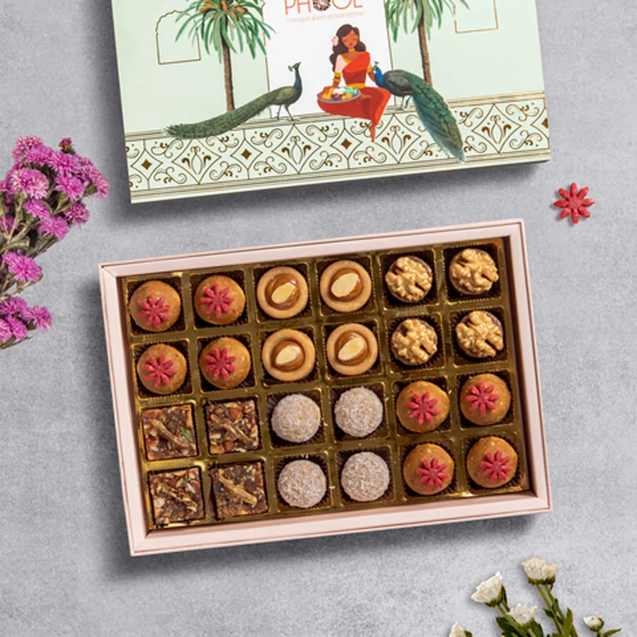 Fig Date N Tropical Indulgence gift box featuring sweets made from natural ingredients, including figs, dates, almonds, and spices, perfect for healthy indulgence.