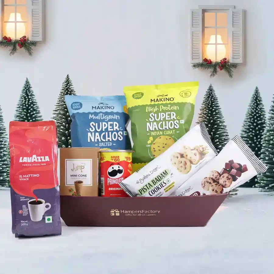 Holiday Indulgence Gift Basket featuring Lavazza coffee, nachos, cookies, Pringles, and cappuccino in a reusable basket.