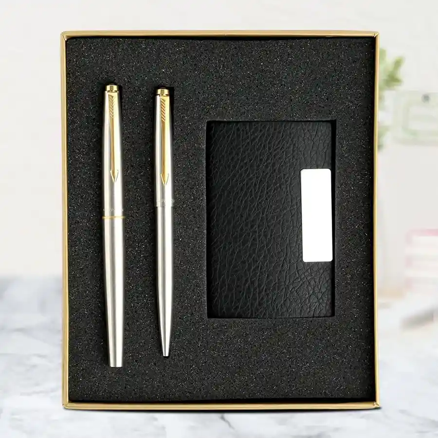 Elegant Parker Galaxy Gold Trim Ball Pen with a stainless steel card holder, presented as a perfect gift set.