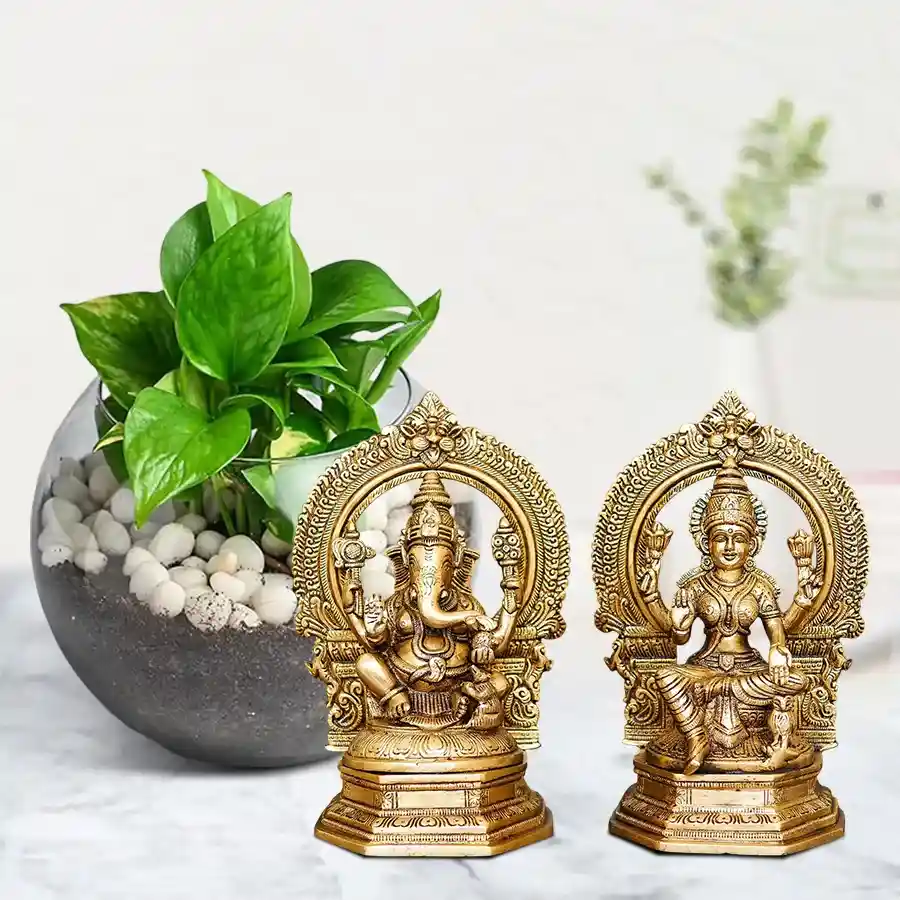 Aesthetic combo featuring a lush money plant in a glass pot and a divine Lakshmi Ganesh idol, perfect for bringing joy and prosperity.