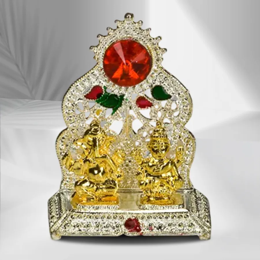 Silver plated mandap adorned with a golden Ganesh Laxmi idol, size 2.5 inches.