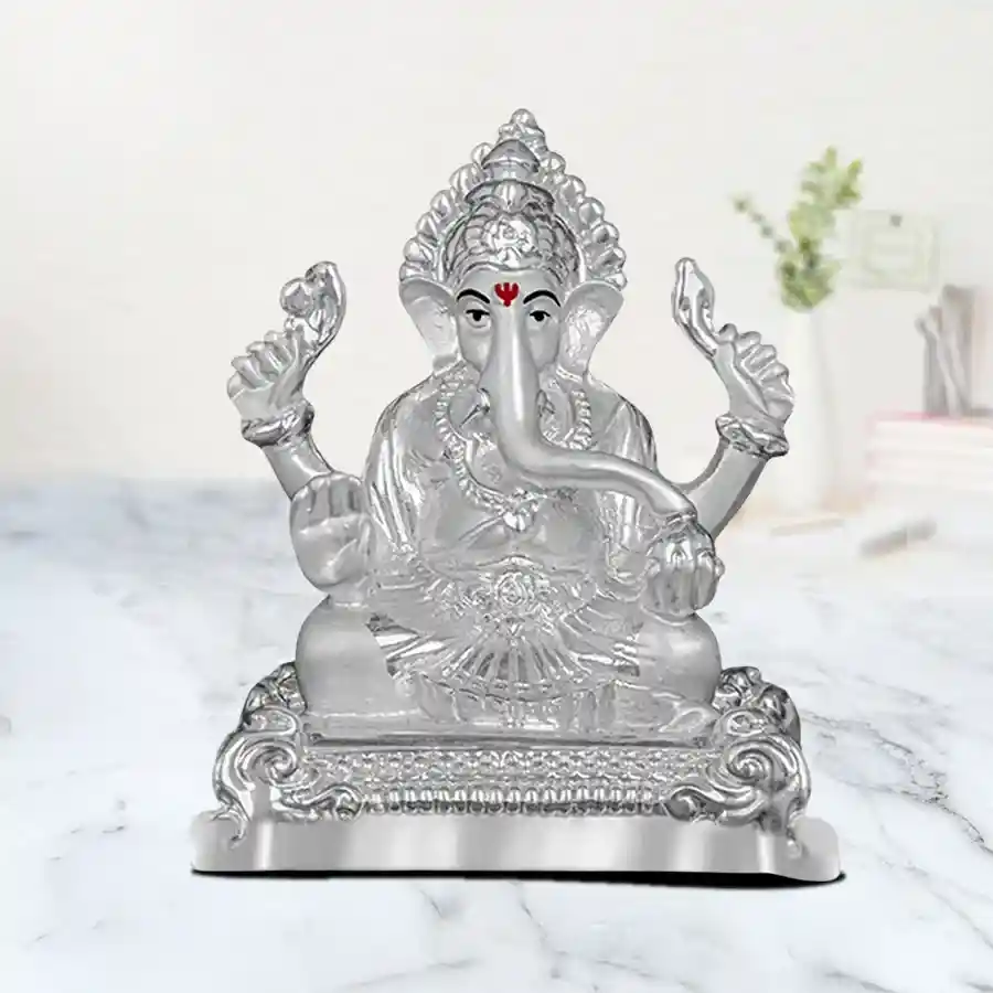 Stunning Divine Silver-Plated Ganesh Idol symbolizing blessings and happiness, perfect for gifting to loved ones.