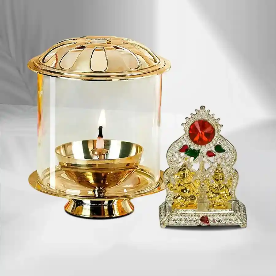 Akhand Diya in brass and Ganesh Laxmi Mandap, a spiritual combo gift.