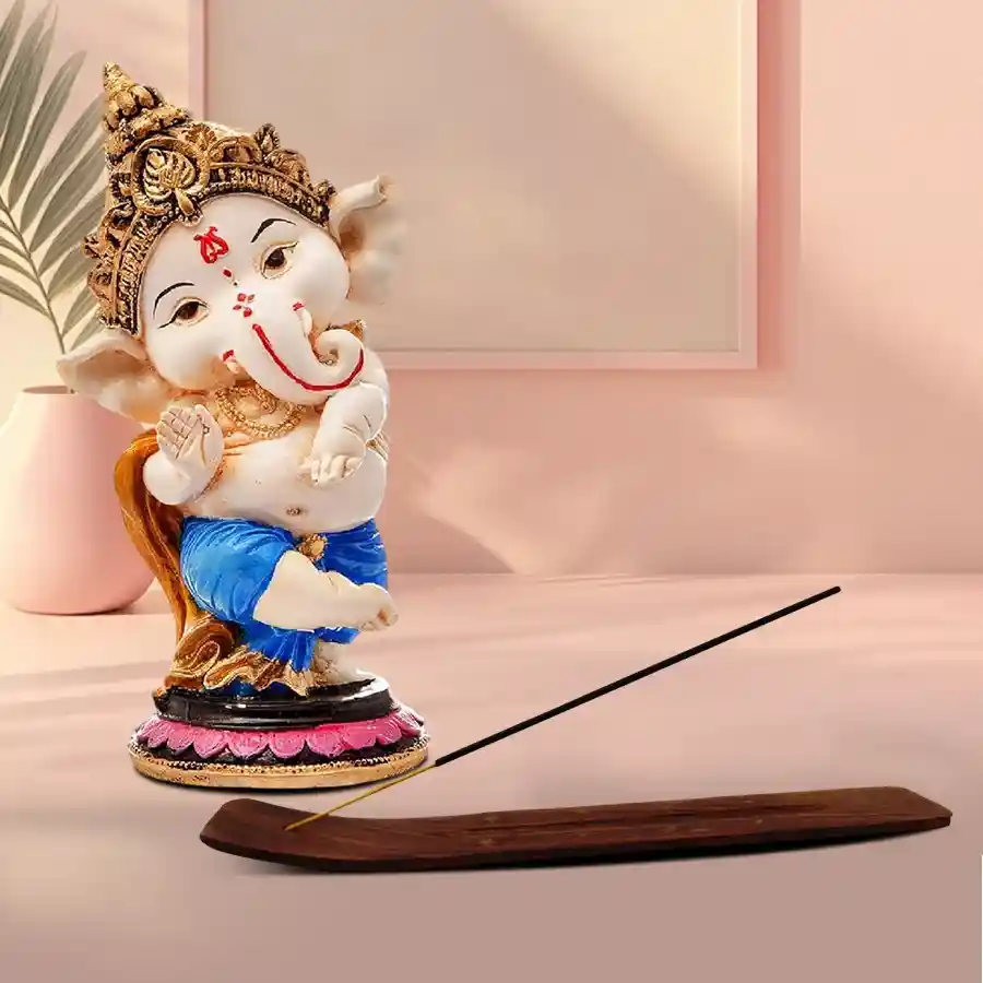 Gold Ganesha idol with wooden Agarbatti stand, perfect for home decor and gifting.