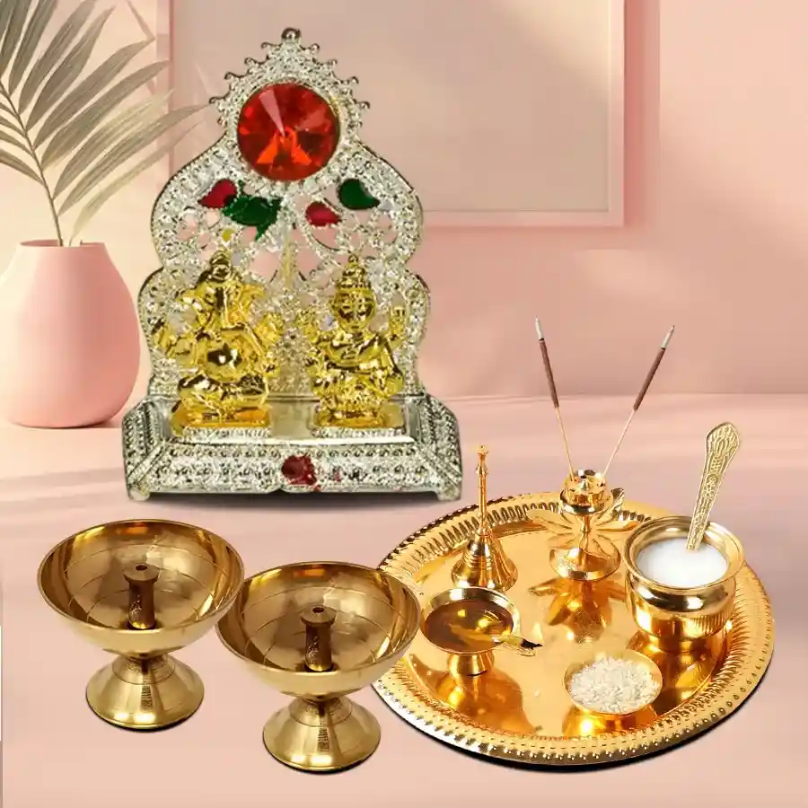 Sacred Pooja Bliss Combo Gift featuring a gold-plated thali, brass diyas, and a Ganesh Laxmi mandap for spiritual ceremonies.