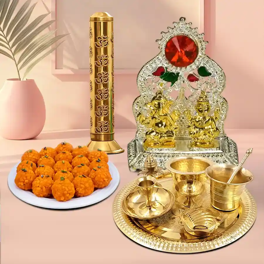 Sacred Harmony Puja Gift Set with brass thali, agarbatti stand, ladoo, and mandap for spiritual rituals.