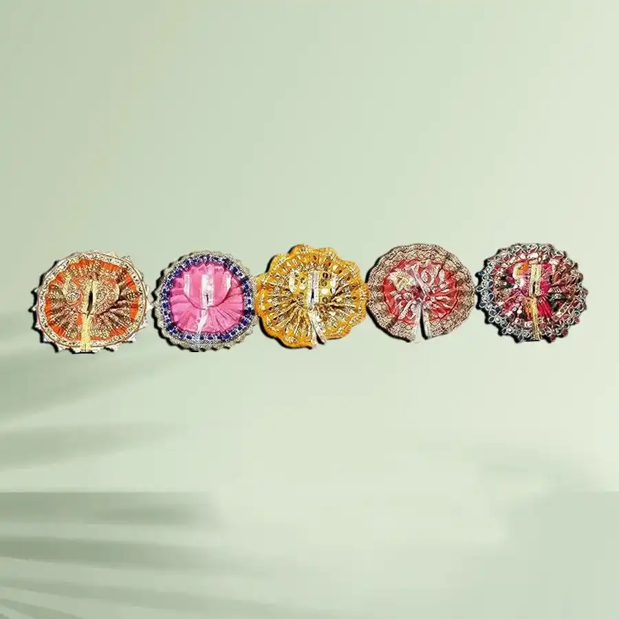 Divine Multicolor Silk Poshak Set for enhancing Puja celebrations.