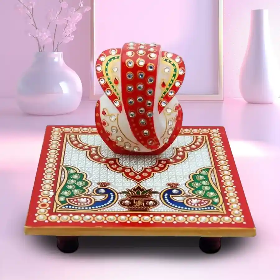 Exquisite 4x4 Marble Ganesh Chowki with a beautiful peacock design.