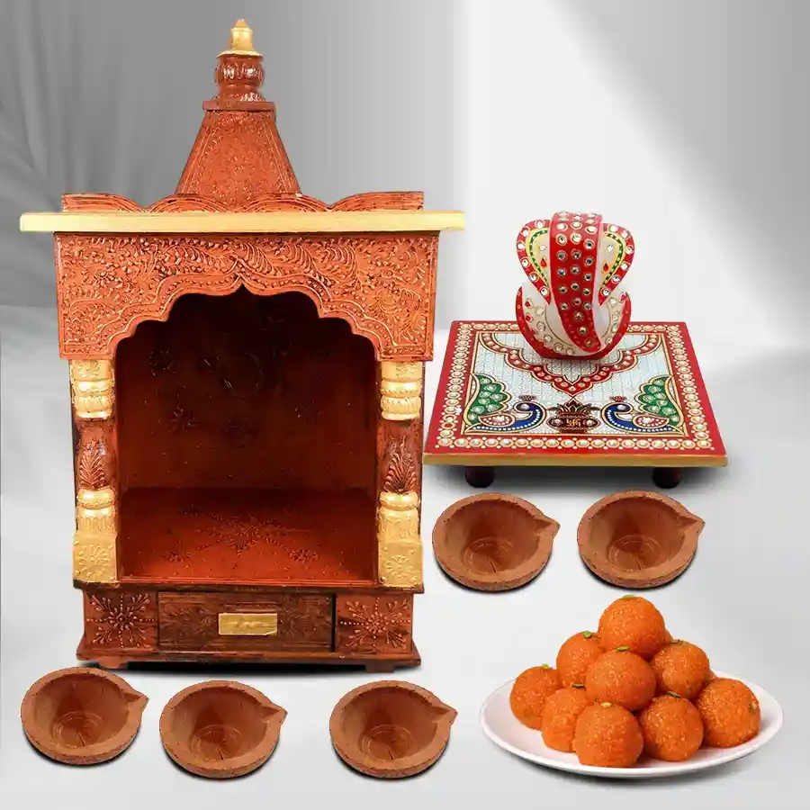 Timeless Wooden Temple Gift Set featuring a wooden temple, marble Ganesh chowki, ladoos, pooja samagri, and mud diyas for spiritual celebrations.