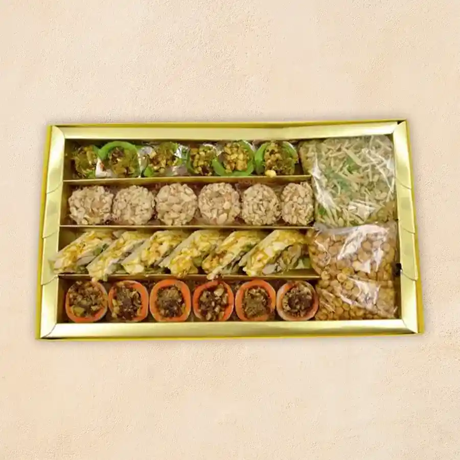 Joyful Indulgence Treats Box featuring Kaju sweets and snacks.