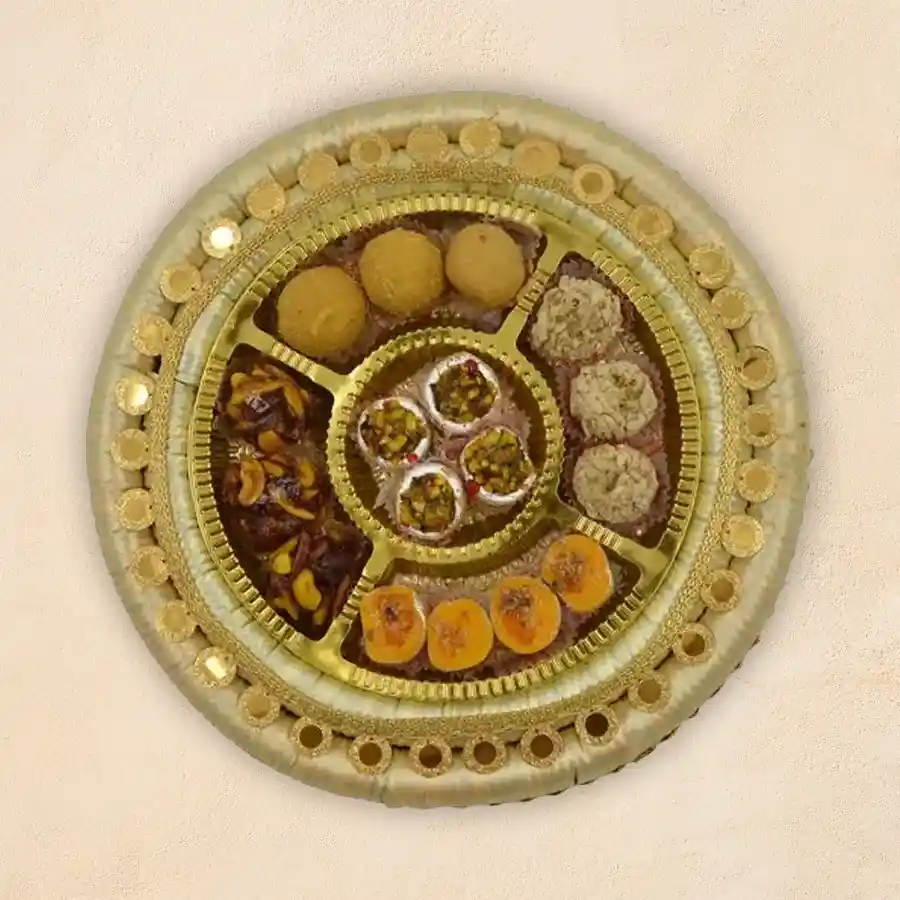 Sweet Harmony Delight Platter featuring Kaju Katori, Mawa Gilory, Kaju Butter Scotch Balls, and assorted laddoos for sharing joy.