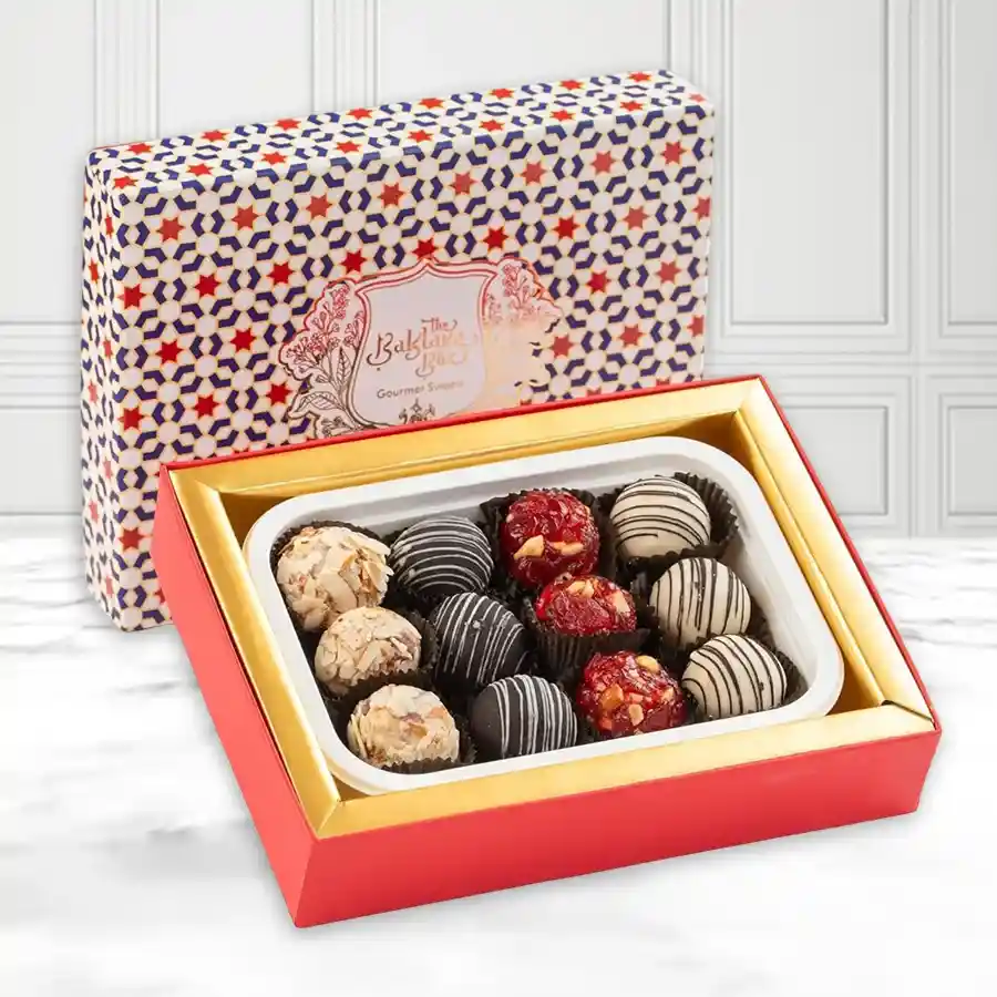 Gourmet Laddu Delight Box showcasing four unique varieties.