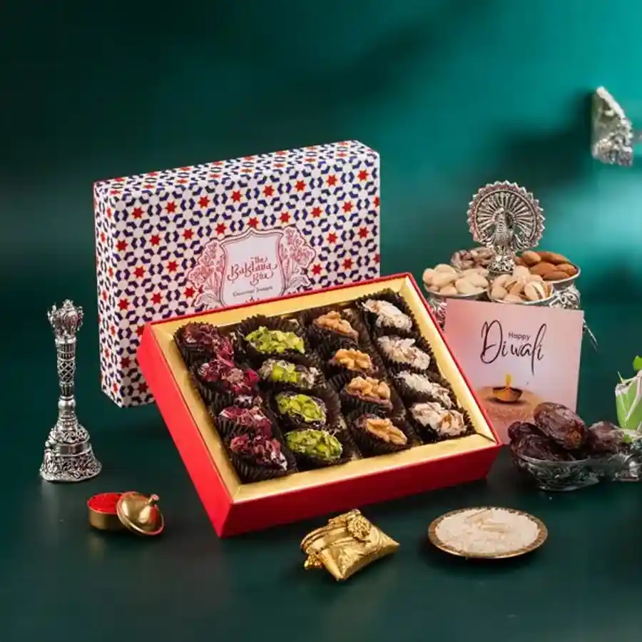 A beautifully arranged White Imperial Assorted Dates Box with nuts and chocolate, perfect for gifting or personal enjoyment.