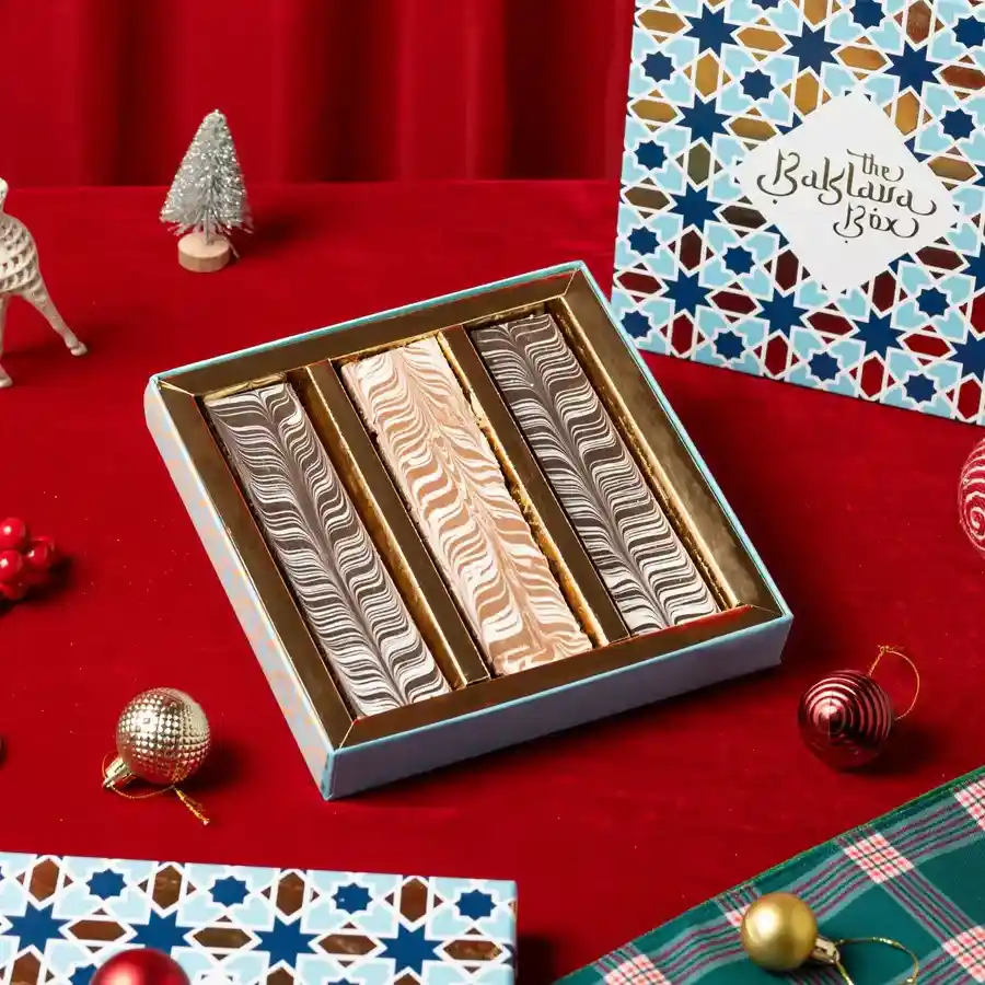Nutella Chocolate Basbousa Delight in a festive red tin.