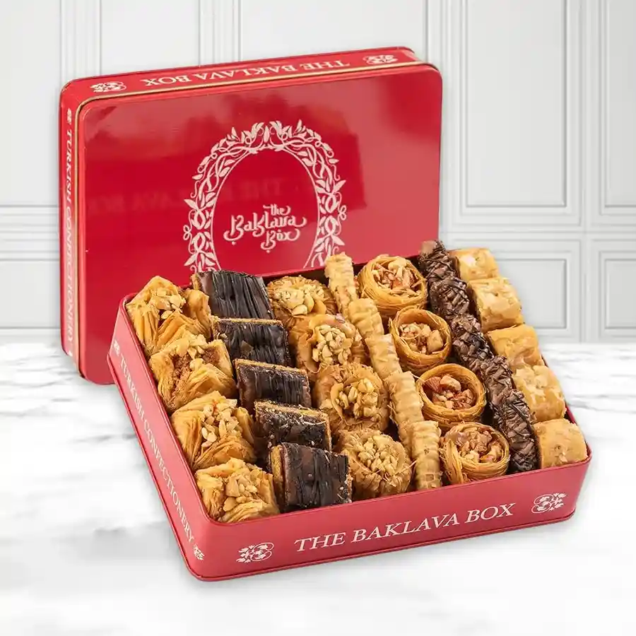 Festive Red Tin Baklava Delight featuring assorted pastry treats in a beautifully designed red box.