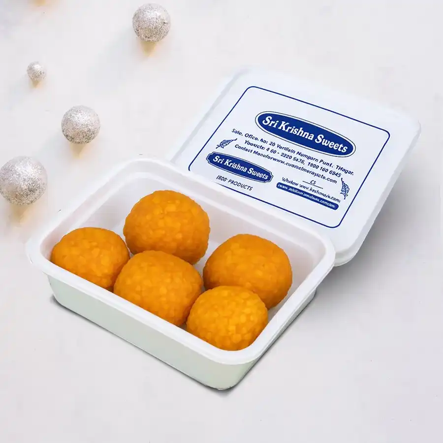 A delicious 250g box of Motichur Laddu, a traditional Indian sweet made from gram flour and cardamom, perfect for festive occasions.