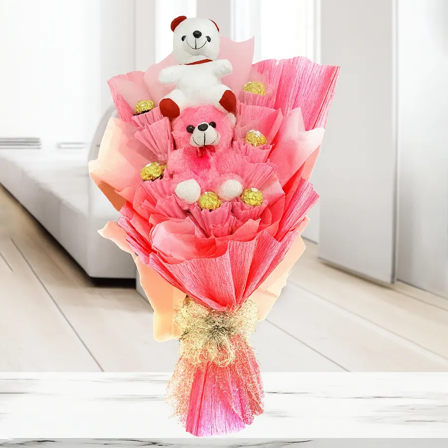 Exclusive bouquet with Ferrero Rocher chocolates and teddy bears wrapped in tissue.