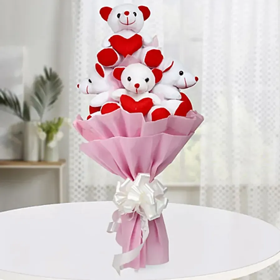 Bouquet featuring 6 small teddies with hearts, perfect for spreading happiness.
