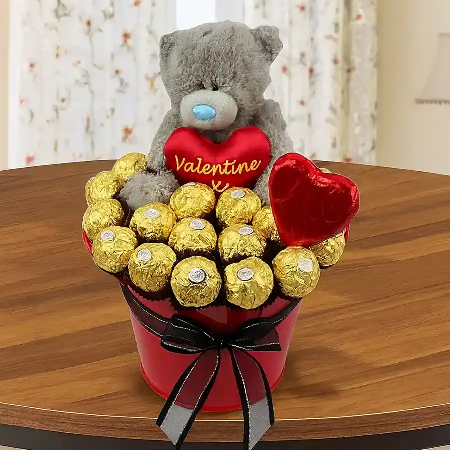 Sweet Moments Bucket filled with Ferrero Rocher chocolates and I Love You teddy bear.