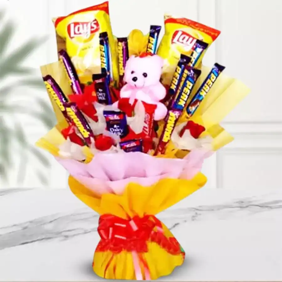 A charming bouquet featuring chocolates, chips, and a 6-inch teddy bear for joyful celebrations.