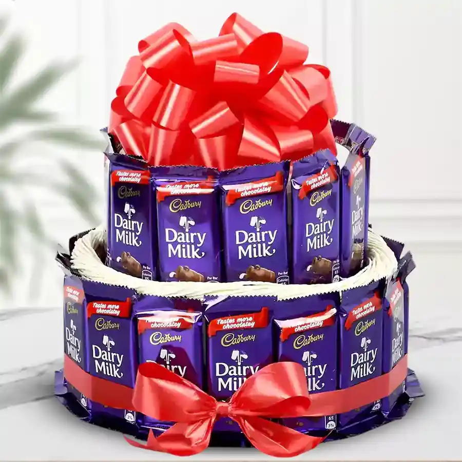 A two-tier arrangement featuring 30 pieces of Cadbury Dairy Milk chocolates, each weighing 13 grams, beautifully presented for gifting.