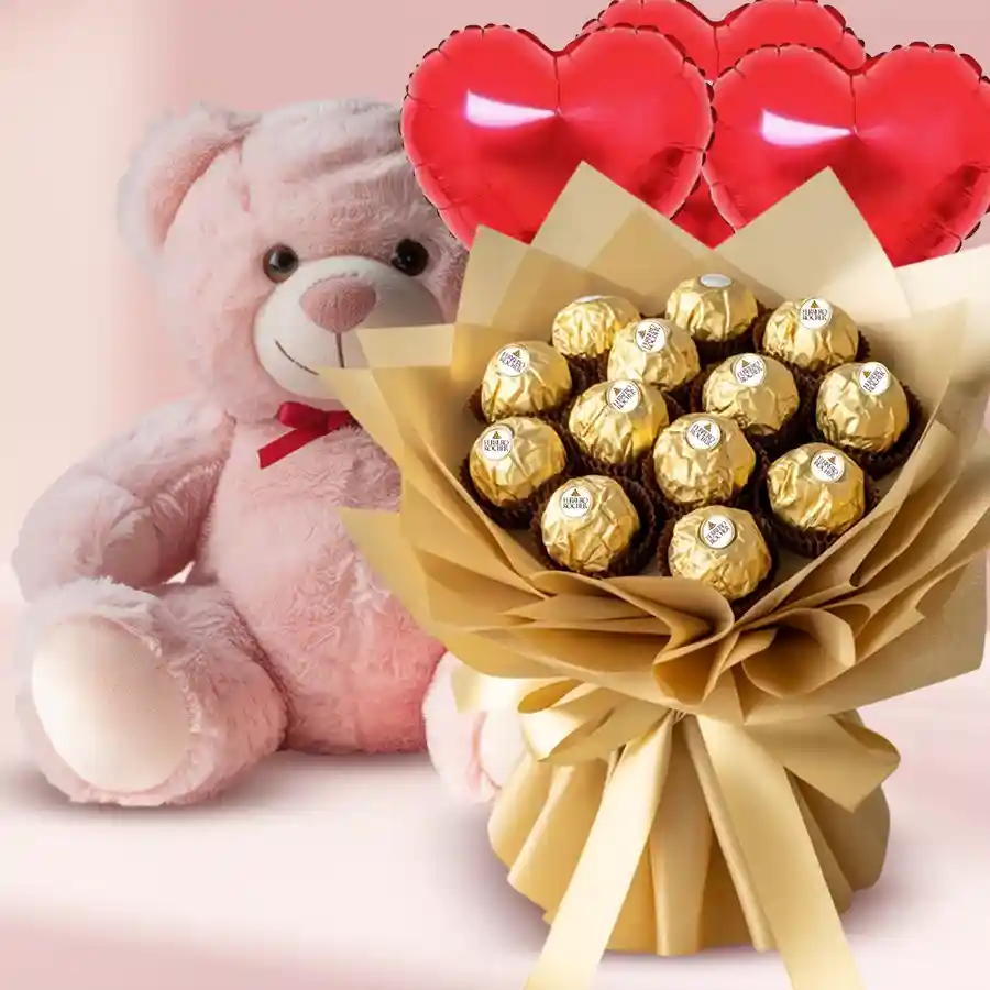 A 12-inch teddy bear with a bouquet of Ferrero Rocher chocolates and colorful "Happy Birthday" Mylar balloons.