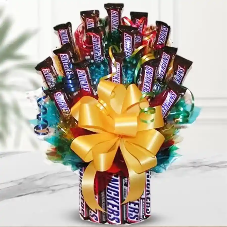 Snickers Delight Tower featuring 25 imported Snickers bars, beautifully arranged for gifting.