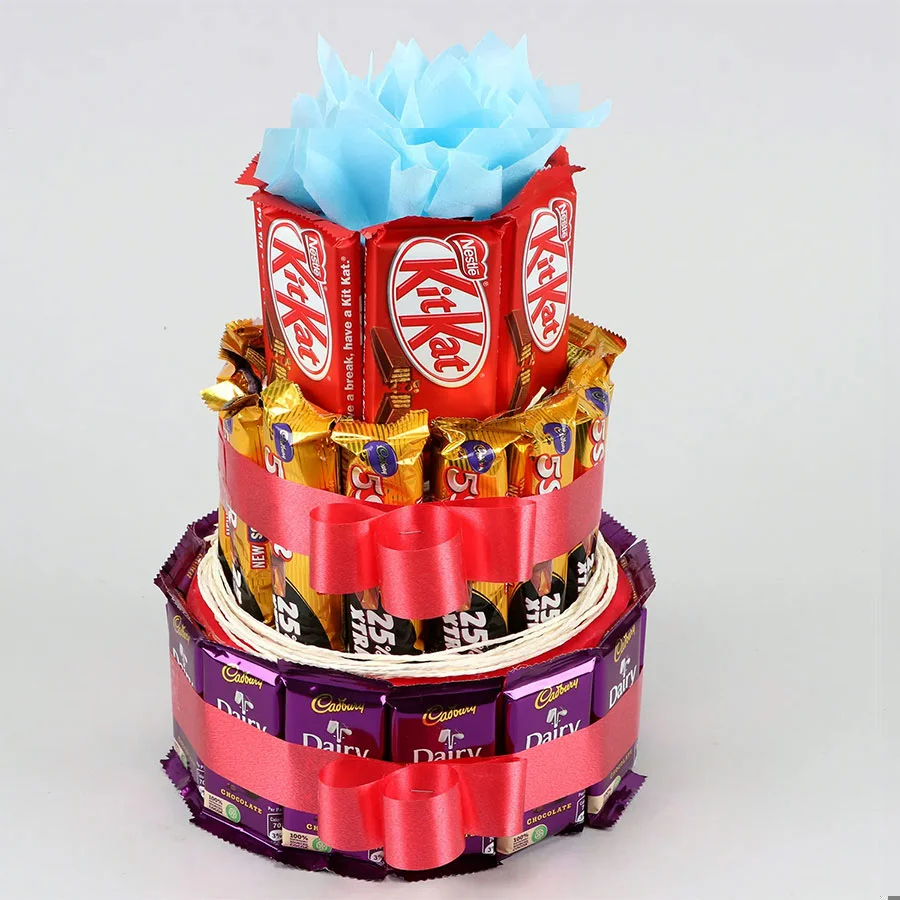 Marvellous 3 tier arrangement of assorted chocolates including Cadbury Dairy Milk, Cadbury Five Star, and Nestle Kitkat.