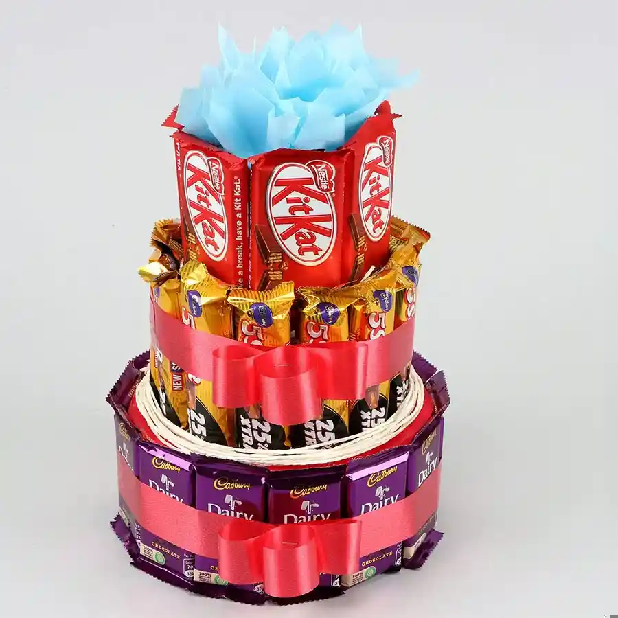 Beautiful three-tier chocolate arrangement featuring Cadbury Dairy Milk, Five Star, and Nestle Kitkat.