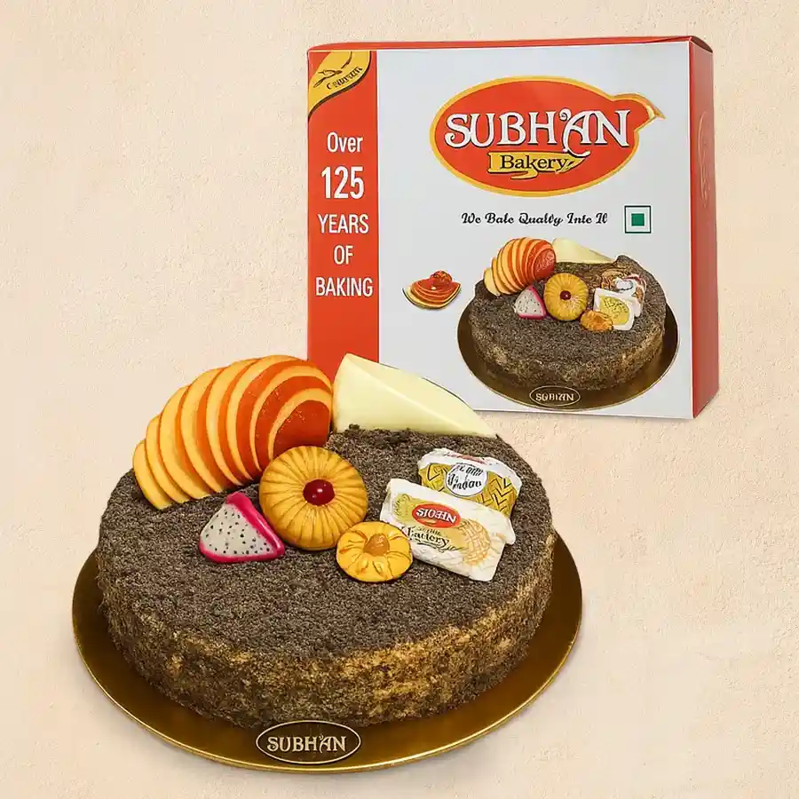 A beautifully decorated 1 lb Black Forest Cake featuring chocolate sponge, whipped cream, and cherries, ideal for celebrations.