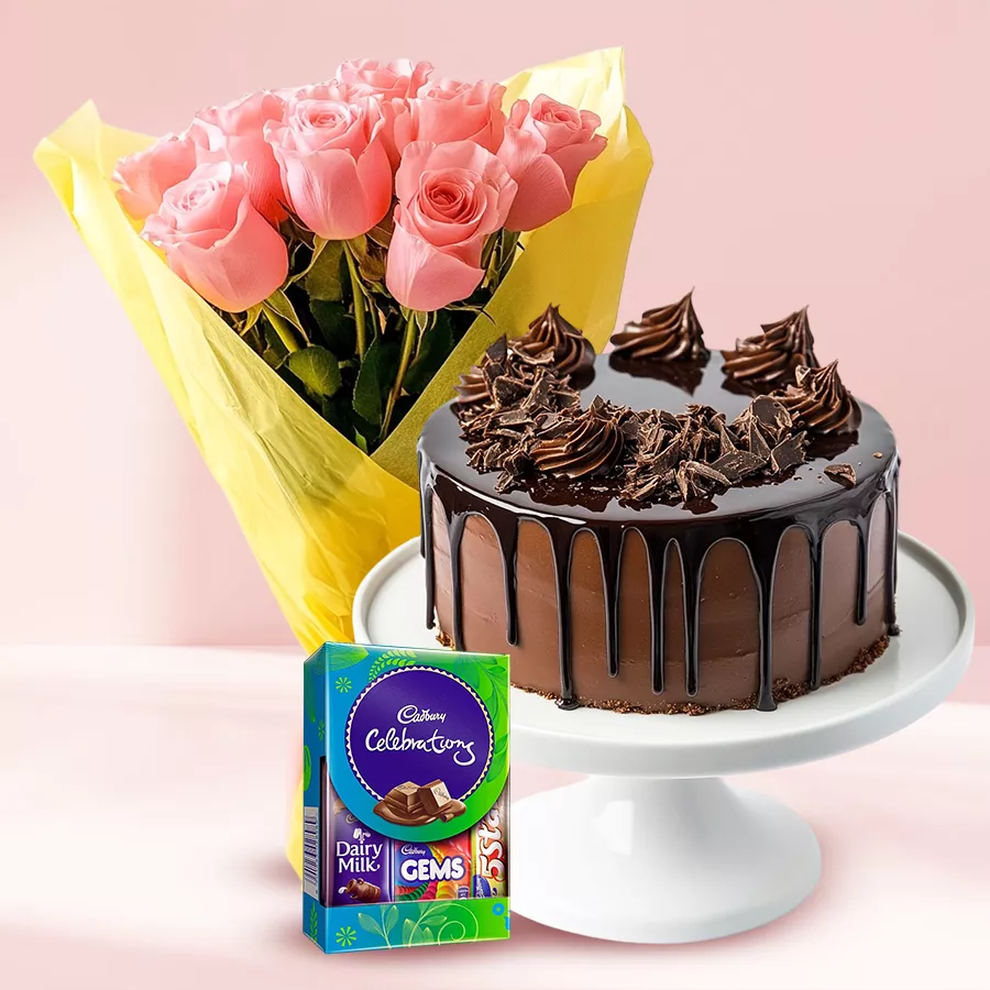 Joyful Blooms and Decadent Treats gift combo featuring pink roses, chocolate cake, and Mini Cadbury Celebration.