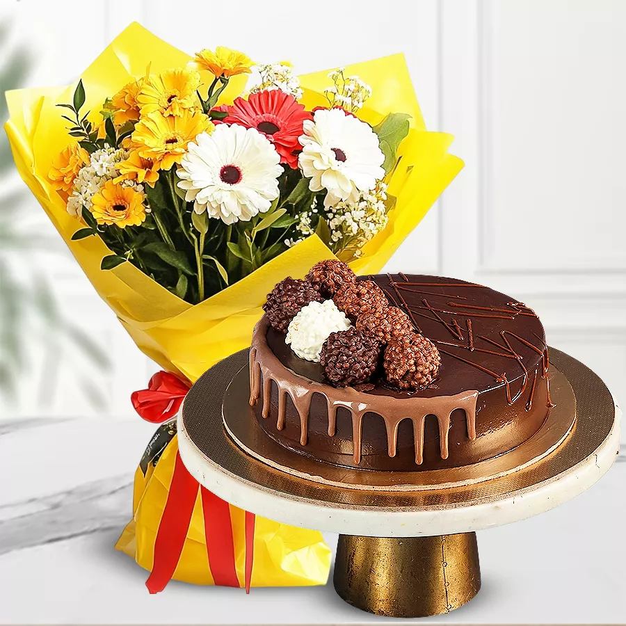 A vibrant bunch of mixed flowers paired with a decadent 1 lb chocolate truffle cake, perfect for celebrations.