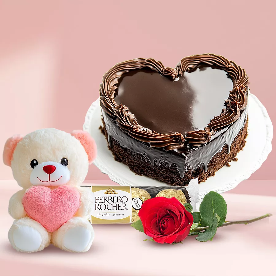 Chocolate Heart Cake with a rose, teddy bear, and Ferrero Rocher chocolates.