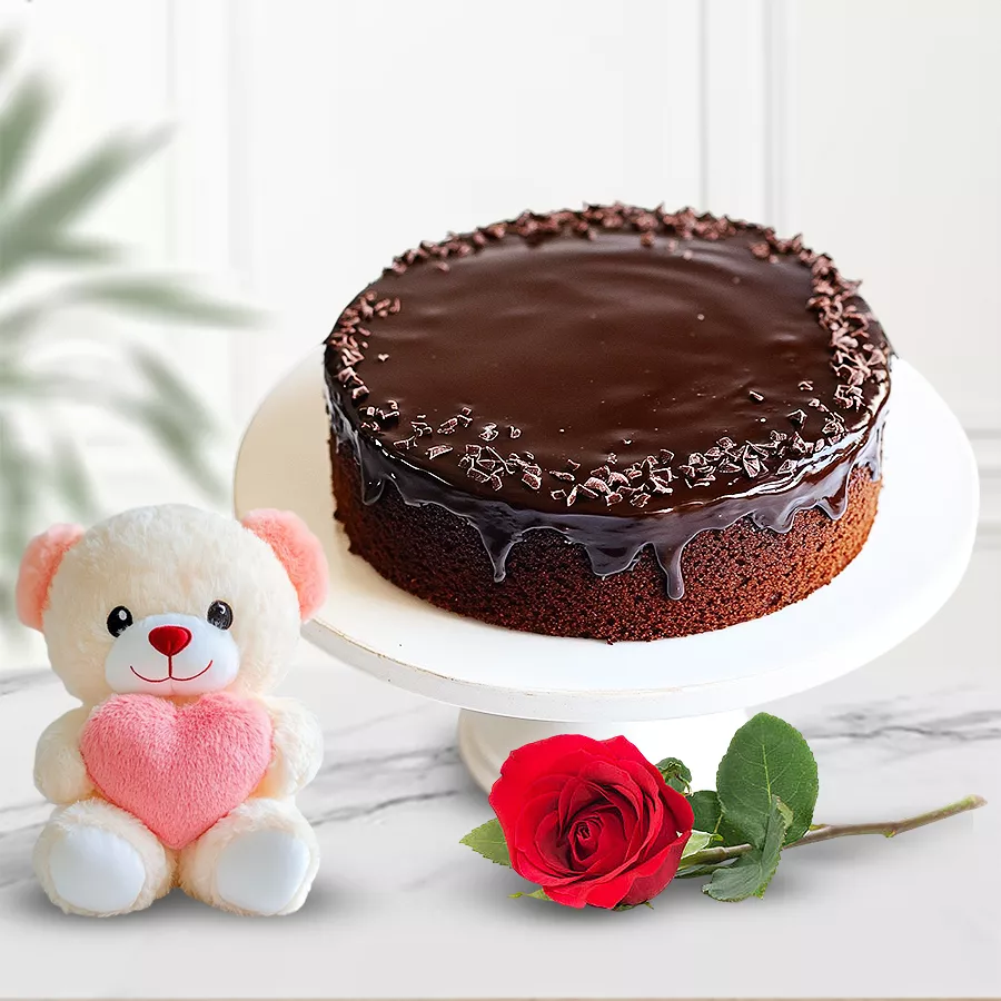 Adorable chocolate cake gift set with a rose and teddy.