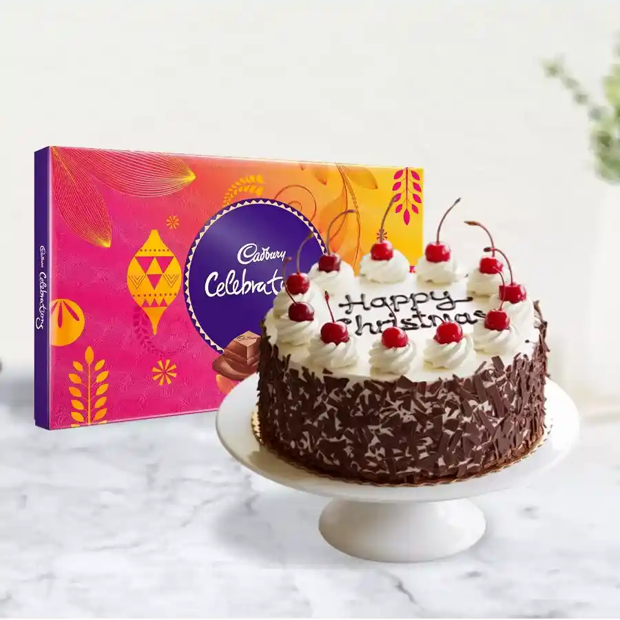 Christmas Bliss Combo featuring a Black Forest Cake and assorted Cadbury chocolates.