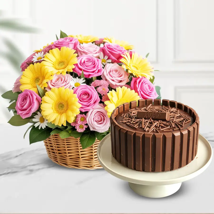 Delicious KitKat Cake with a vibrant seasonal flower basket for Christmas celebrations.