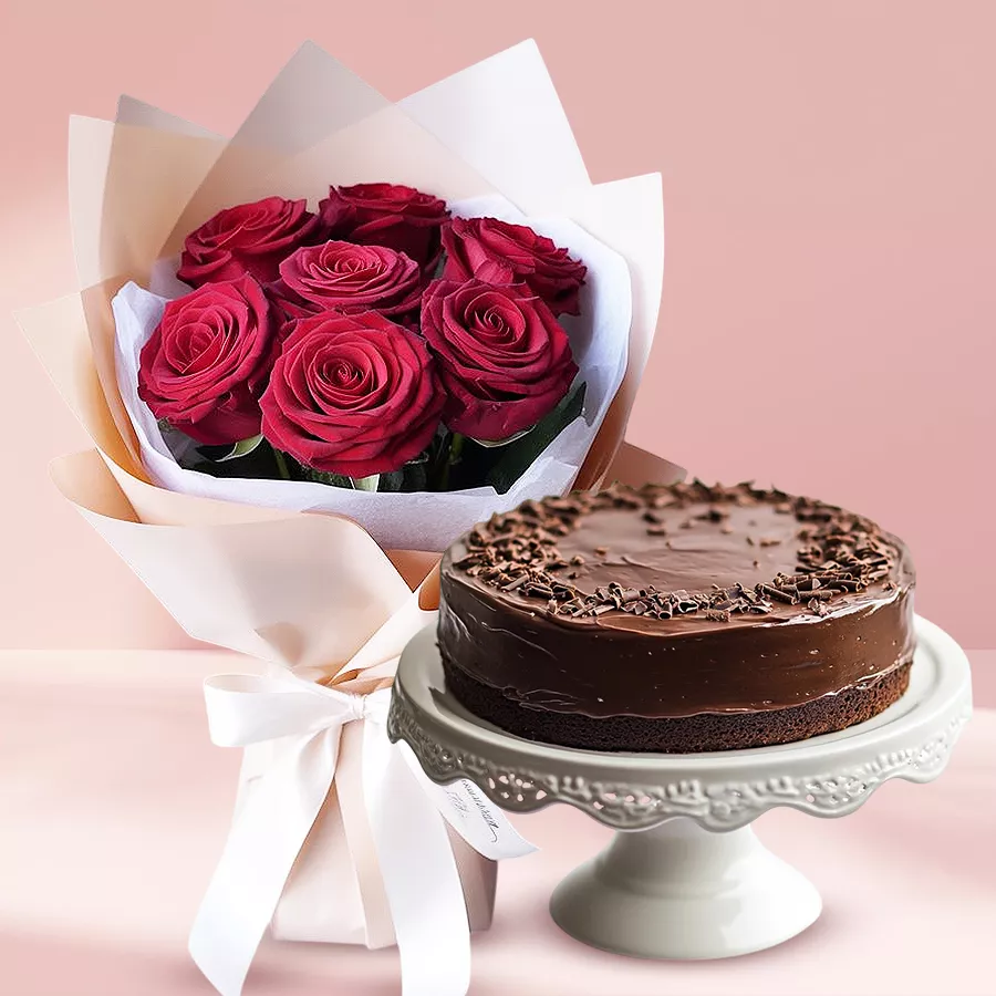 A bouquet of vibrant red roses accompanied by a 1 lb chocolate cake, perfect for romantic occasions.