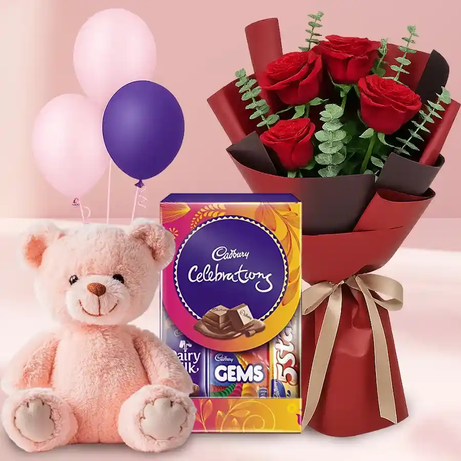 Adorable gift combo featuring red roses, chocolates, a teddy bear, and colorful balloons, perfect for expressing love and affection.