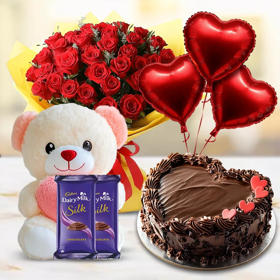 Cherished Moments Gift Hamper with teddy, red roses, chocolate cake, and balloons.