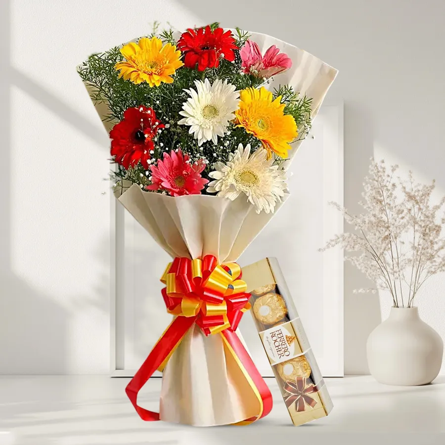 Vibrant gerbera bouquet with Ferrero Rocher chocolates, perfect gift combination.