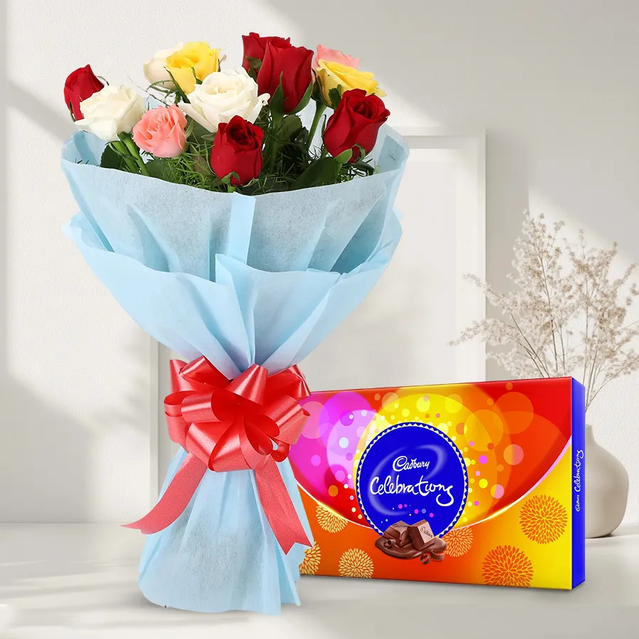 Gorgeous 12 mixed roses bouquet with a Cadbury Celebrations pack.