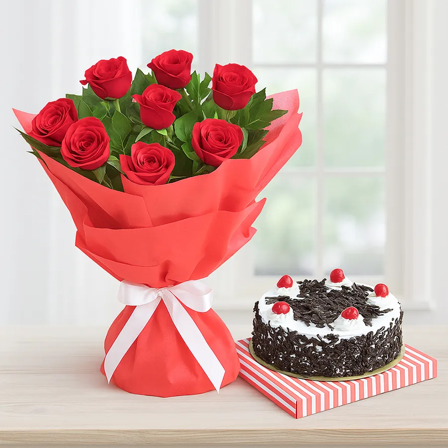 Delightful Black Forest Cake paired with a bouquet of 10 vibrant Red Roses.